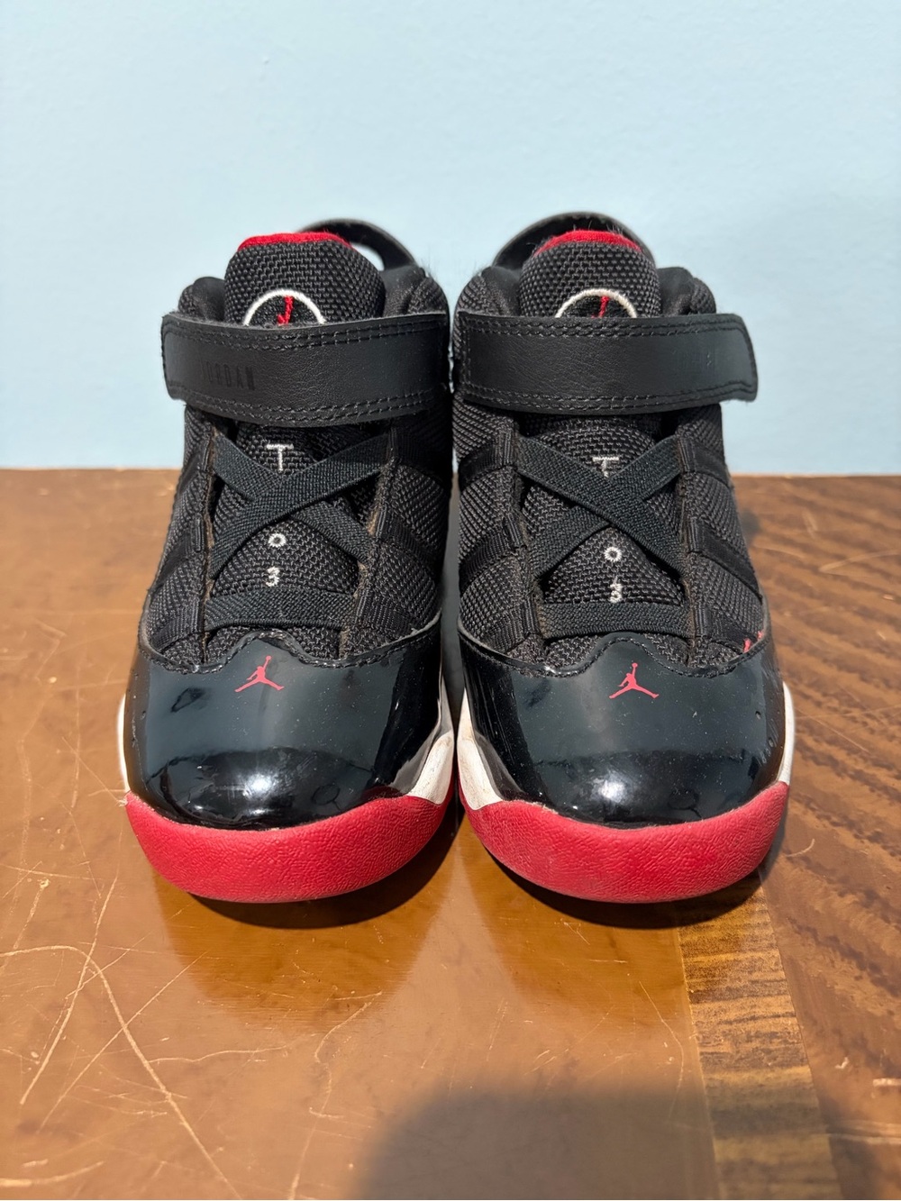 Jordan Kids Black and Red High-Top Sneakers